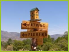 Signs near Bullion Creekside Retreat indicating fun activities to do in Marysvale Utah